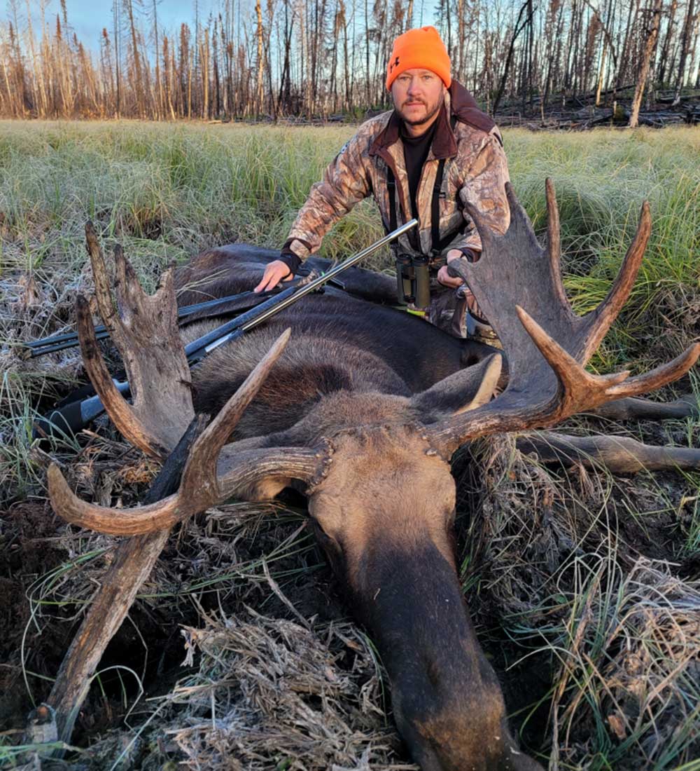 Hunter with moose